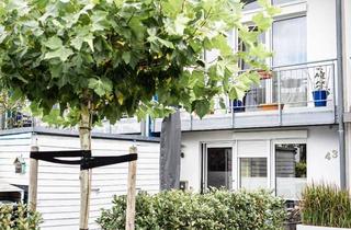 Reihenhaus kaufen in 40549 Düsseldorf, Düsseldorf - Charmantes Reihenhaus mit Südwest-Ausrichtung für Familien