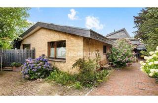 Haus kaufen in 26209 Hatten, Hatten - Großzügiges Zweifamilienhaus mit traumhaftem Gartenparadies und nachhaltiger Ausstattung