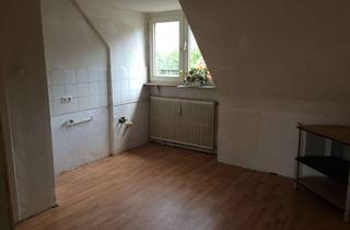 Wohnung kaufen in 45888 Bulmke-Hüllen, Gelsenkirchen-Bulmke: DG-Wohnung mit Rendite und Ausbaupotenzial