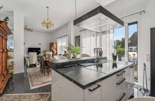 Penthouse kaufen in 45657 Recklinghausen, Repräsentatives Penthouse mit Dachterrasse, Einbauküche und Einzelgarage direkt am Rosengarten