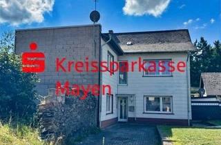 Haus kaufen in 56753 Welling, Charmantes Zweifamilienhaus mit Balkon und Garage