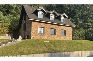 Einfamilienhaus kaufen in Am Heidberg, 52134 Herzogenrath, Ruhiges freistehendes Einfamilienhaus in Hanglage mit zwei Garagen