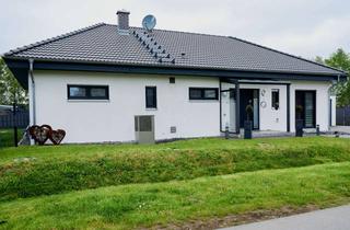 Haus kaufen in 38154 Königslutter, Moderner Traumbungalow in Boimstorf von 2015 mit Klimaanlage, Kamin und Fußbodenheizung