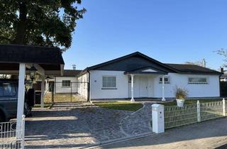 Haus kaufen in 25474 Ellerbek, Hochwertiger amerikanischer Bungalow in ruhiger Lage mit separater Einliegerwohnung