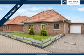 Einfamilienhaus kaufen in 26434 Wangerland, Lichtdurchflutetes Eigenheim mit Terrasse, Garten und Seezugang am Wangermeer.