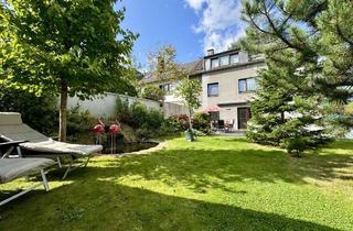 Wohnung kaufen in 44791 Grumme, Stadtparkflair trifft Gartenparadies - EG Wohnung mit Garten und 4 Garagen