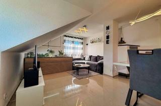 Wohnung kaufen in 71404 Korb, Korb: Charmante Dachgeschosswohnung mit Weitblick - Wohnen über den Dächern!