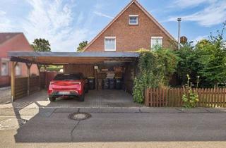 Doppelhaushälfte kaufen in 24768 Rendsburg, Charmante Doppelhaushälfte in ruhiger und beliebter Wohnlage von Rendsburg-Schleife