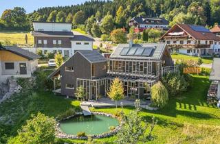 Haus kaufen in 79875 Dachsberg, IMMORath.de - Idyllisches Holzhaus: Natur und Design vereint