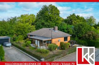 Haus kaufen in 38154 Königslutter, Ein Zuhause mit Wohlfühlfaktor – Bungalow mit großem Garten und Kamin in Königslutter