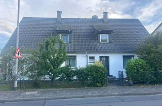 Doppelhaushälfte kaufen in 65479 Raunheim, Kernsanierte Doppelhaushälfte im zentralen Raunheim