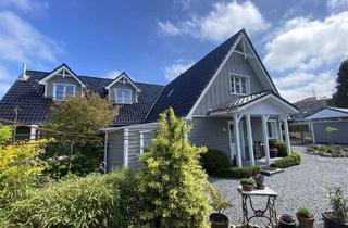 Haus kaufen in 24235 Wendtorf, Modernes renditestarkes Zweifamilienhaus mit zwei weiteren Wohnungen fußläufig zum Strand!