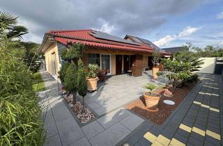 Haus kaufen in 67575 Eich, Freistehender Bungalow mit traumhaftem Gartenparadies, moderner Technik und Garage