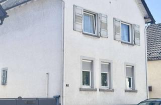 Einfamilienhaus kaufen in 63225 Langen, Renovierungsbedürftiges Mehrgenerationenhaus mit 8-Zimmern und Garage in Langen (Hessen)