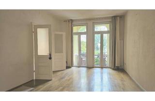 Wohnung kaufen in Merianstraße 24, 60316 Nordend-Ost, „Wohnen mit Charme" Hochparterre-Altbauwohnung mit Loggia und grünem Garten im Herzen von Bornheim!