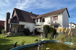 Haus kaufen in 31683 Obernkirchen, Zweifamilienhaus mit Sauna, Kachelofen und Schwimmteich in bester Lage von Obernkirchen