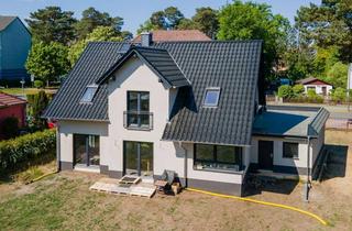 Einfamilienhaus kaufen in 15526 Bad Saarow, Mit Erdwärme, Fußbodenheizung, Einbauküche, Garage, Kamin u.v.m.: Neubau-Einfamilienhaus Bad Saarow