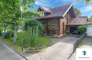 Einfamilienhaus kaufen in 55291 Saulheim, Familienfreundliches Holzhaus aus finnischem Qualitätsvollholz – großer Garten, Sauna & Kamin