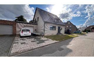 Einfamilienhaus kaufen in 41363 Jüchen, Jüchen - Modernisiertes freistehendes Einfamilienhaus mit großem Garten