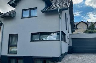 Doppelhaushälfte kaufen in 56626 Andernach, Andernach - Moderne Doppelhaushälfte mit großer Garage und Wärmepumpe