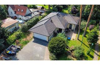 Haus kaufen in 14612 Falkensee, Falkensee - Bungalow Energieklasse A mit Doppelgarage, Erdwärme, Kamin