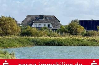 Doppelhaushälfte kaufen in 25845 Nordstrand, Doppelhaushälfte zzt. in 2 WE aufgeteilt mit Blick auf einen kleine See direkt hinter dem Außendeich