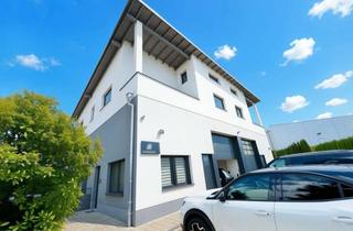 Gewerbeimmobilie kaufen in 63571 Gelnhausen, Neuwertige und vielseitig nutzbare Gewerbeimmobilie mit Lagerräume, Büroräumen und Wohnung