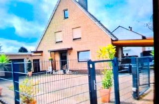 Einfamilienhaus kaufen in 33829 Borgholzhausen, Borgholzhausen - Einfamilienhaus mit Einliegerwohnung zu Verkaufen