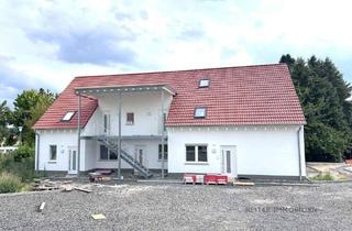 Wohnung kaufen in 36088 Hünfeld, Hünfeld / Oberrombach - Hünfeld-Oberrombach: Erstbezug im Neubau: 83 m²-3 Zimmer-modernes Wohnen mit eigenem Garten