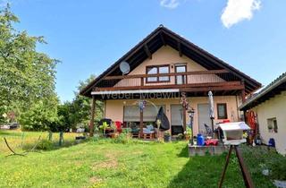 Haus kaufen in 51503 Rösrath, Freistehendes 2-Parteienhaus mit Terrasse, Loggia, Kellerbar + Südwest-Garten in begehrter Wohnlage