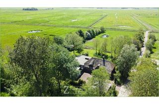 Haus kaufen in 25836 Katharinenheerd, Energetisch modernisiert: Reetdachkate mit Einliegerwohnung**