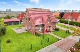 Einfamilienhaus kaufen in 26736 Krummhörn, Top gepfl. Einfamilienhaus mit Nebengebäude, Terrasse, Gartenanlage in ruhiger Wohnlage!