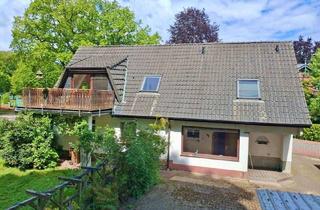 Haus kaufen in 25355 Barmstedt, Zweifamilienhaus mit viel Potential und großzügigem Grundstück in schöner Lage von Barmstedt