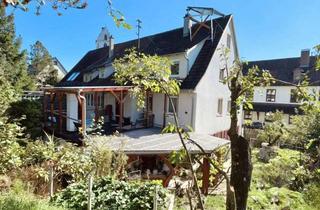 Haus kaufen in 78554 Aldingen, Stilvolles Reihenendhaus mit drei separaten Wohneinheiten