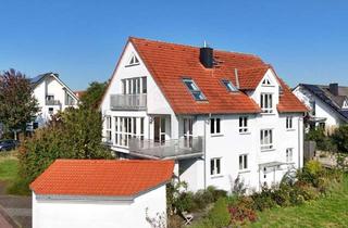 Mehrfamilienhaus kaufen in 61381 Friedrichsdorf, Attraktives Mehrfamilienhaus in Friedrichsdorf - Burgholzhausen. Wohnen in ruhiger Lage.