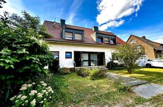 Anlageobjekt in 33330 Gütersloh, Gepflegtes Mehrfamilienhaus mit zwei Eingängen und drei Wohneinheiten