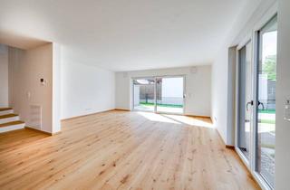 Wohnung kaufen in 85659 Forstern, AIGNER - Wohnen mit Zukunft: Energieeffiziente Maisonettewohnung mit Haus-im-Haus-Charakter