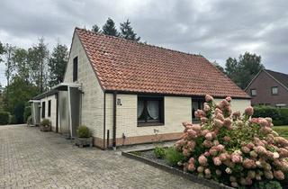 Haus kaufen in 26180 Rastede, Zweifamilienhaus mit großem Grundstück