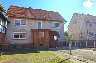 Einfamilienhaus kaufen in 36110 Schlitz, Schlitz - Charmantes Fachwerkhaus mit Kamin, Werkstatt und riesigem Garten - ländliches Wohnen mit Herz und Platz zum Leben