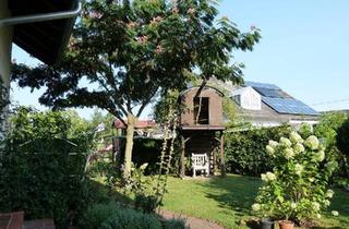 Wohnung kaufen in 76461 Muggensturm, Muggensturm - Eigentumswohnung mit Terasse, Balkon & eigenem Garten