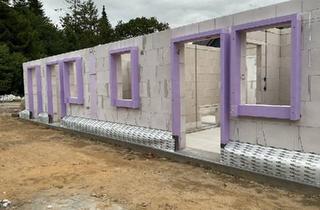 Haus kaufen in 25821 Bredstedt, Bredstedt - Doppelhaus im Bau, Rohbau EG fertig, gute Infrastruktur, 2400 EW