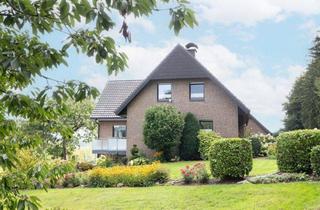 Einfamilienhaus kaufen in 49176 Hilter, Großzügiges Einfamilienhaus trifft auf ruhige Waldrandlage in Hilter