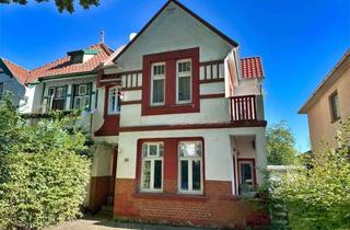 Doppelhaushälfte kaufen in 25421 Pinneberg, Charmante Altbau-Doppelhaushälfte mit Stellplätzen und Garten in beliebter Lage von Pinneberg!