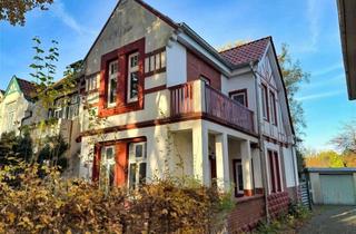 Doppelhaushälfte kaufen in 25421 Pinneberg, Modernisierte Altbau-Doppelhaushälfte mit Stellplätzen und Gartenoase in beliebter Lage von Pinneb