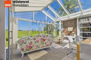 Haus kaufen in 26434 Wangerland, Letzte Chance bis 08.11.2025 wegen Winterpause: 237m² Bungalow & Wohnwintergarten für 365 Tage Grün.