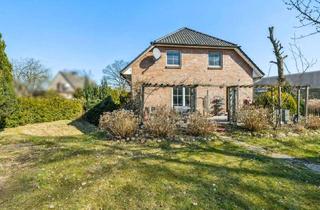 Doppelhaushälfte kaufen in 25451 Quickborn, Charmante Doppelhaushälfte mit Einliegerwohnung und großem Garten in beliebter Lage von Quickborn