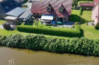Haus kaufen in 26844 Jemgum, Wie neu: Traumhaus mit Wassergrundstück, PV-Anlage und Speicher im Fischerdorf Ditzum