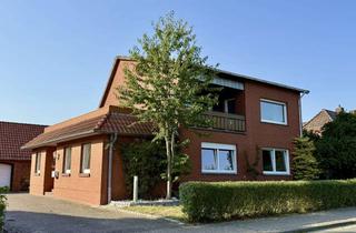 Haus kaufen in 31613 Wietzen, Modernisiertes Zweifamilienhaus in Wietzen / großer Garten / 2x Garagen und Anbau!