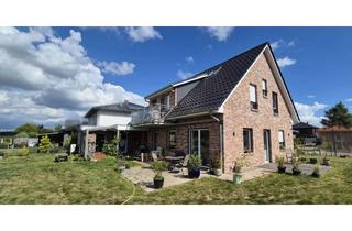 Einfamilienhaus kaufen in Buxtehuder Straße 34, 28870 Ottersberg, Neuwertiges Einfamilienhaus (KfW 55) inkl. Einliegerwohnung mit traumhaftem Blick über die Wiesen