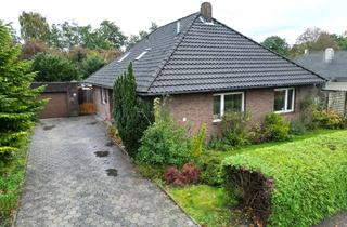 Haus kaufen in 26725 Widdelswehr/Jarßum, Ebenerdiges Wohnen in Emden-Widdelswehr – Bungalow mit Garten, Garage und Bootssteeg in ruhiger Lage